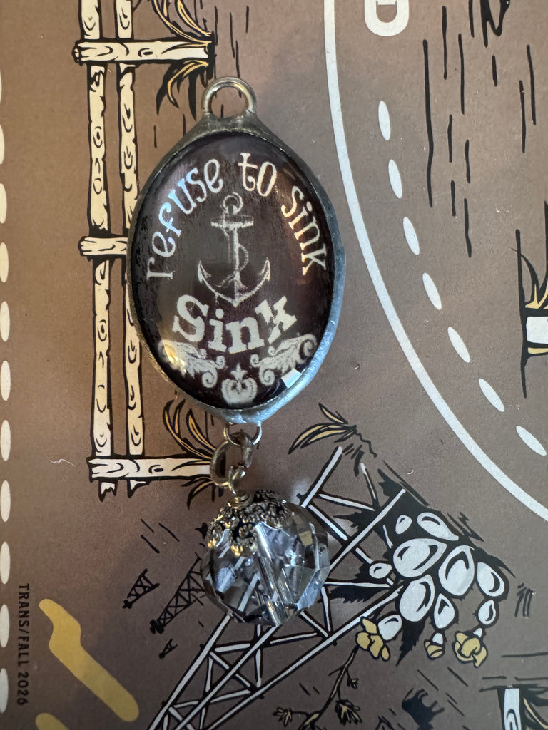 Domed 2 Sided Charm Refuse To Sink Crystal